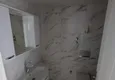 Доступная покупка Трехкомнатная квартира в Махмутларе в молодом современном комплексе 11 