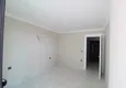Доступная покупка Новая квартира в Махмутларе с чистовой отделкой, в благоустроенном комплексе 14 