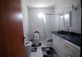 Доступная покупка Трехкомнатная квартира в районе Махмутлар с видом на море 18