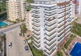 Купить Большая двухкомнатная квартира в Махмутларе, в молодом комплексе  6 