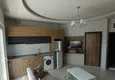Доступная покупка Меблированная квартира в Махмутларе в современном жилом комплексе 1 