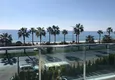 Купить Двухкомнатная квартира в районе Махмутлар с прямым видом на море 2 