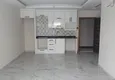 Доступная покупка Двухкомнатная квартира в Махмутлар в жилом комплексе рядом с морем 3 