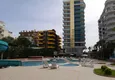 Купить Двухкомнатная квартира в районе Махмутлар с прямым видом на море 8 