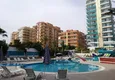 Купить Двухкомнатная квартира в районе Махмутлар с прямым видом на море 9 