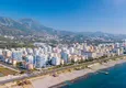 Купить Квартира в Махмутларе с мебелью в комплексе премиум класса на первой линии 9 