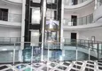 Купить Двухкомнатная квартира в районе Махмутлар в новом современном жилом комплексе 7
