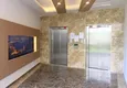 Купить Квартира в Махмутларе с мебелью и частичным видом на море 13 