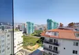 Доступная покупка Квартира в Махмутларе с мебелью и частичным видом на море 11 