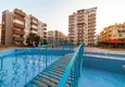 Купить Квартира в Махмутлар четырёхкомнатная с отдельной кухней 14