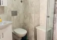 Доступная покупка Квартира в центре Алании с мебелью в новом доме городского типа 14