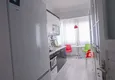 Доступная покупка Квартира в Алании, меблированная с двумя спальнями и отдельной кухней в городском доме 6 