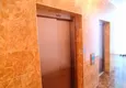 Купить Квартира в Махмутларе трехкомнатная с частичным видом на море в молодом комплексе 16 