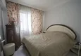 Купить Квартира в Алании, меблированная с двумя спальнями и отдельной кухней в городском доме 4 