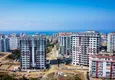 Купить Современный многоквартирный жилой комплекс в Махмутларе 8 