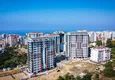 Купить Современный многоквартирный жилой комплекс в Махмутларе 9 