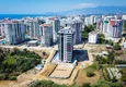 Купить Современный многоквартирный жилой комплекс в Махмутларе 2 