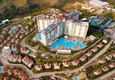 Купить Квартира в Махмутларе двухуровневая видовая с мебелью в элитном жилом комплексе отельного типа 4 