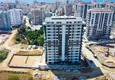 Купить Современный многоквартирный жилой комплекс в Махмутларе 1 