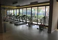 Купить Новые пентхаусы в центре Аланьи в жилом комплексе рядом с морем 32 