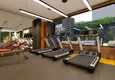 Купить Новый инвестиционный проект в центре Махмутлара рядом с морем 25 