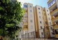 Купить Квартира в Махмутларе с мебелью, отдельной кухней в комплексе городского типа  3 