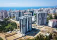 Купить Квартира в новом комплексе в Махмутларе с чистовой отделкой 1 