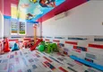 Купить Квартира в Махмутларе двухкомнатная, с современным интерьером 13 