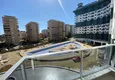 Доступная покупка Квартира в Махмутларе двухкомнатная в строящемся комплексе  12 