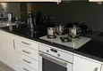 Доступная покупка Квартира в Махмутларе с мебелью и отдельной кухней 14 