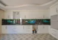 Доступная покупка Квартира в Махмутларе отдельная кухня, 4 спальни, вид на море и горы 12 
