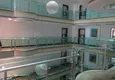 Купить Квартира в центре Махмутлара с мебелью, застекленным балконом  12 