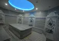 Купить Двухкомнатная квартира в районе Тосмур с видом на море 19 