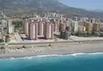 Купить Квартира в Махмутларе с мебелью в комплексе на первой береговой линии 9 