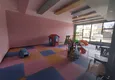 Купить Квартира в Махмутларе с чистовой отделкой, отдельной кухней в новом комплексе 9 
