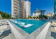 Купить Квартира в Махмутларе с чистовой отделкой, 2 спальни, вид на горы  5 