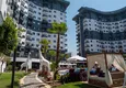 Купить Квартира в Махмутларе двухкомнатная в строящемся комплексе  17 