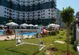 Купить Квартира в Махмутларе двухкомнатная в строящемся комплексе  23 