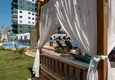 Купить Квартира в Махмутларе двухкомнатная в строящемся комплексе  27 
