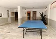 Купить Трехкомнатные апартаменты в Махмутларе с отдельной кухней 16 