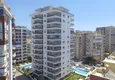 Купить Квартира в районе Махмутлар трехкомнатная в современном жилом комплексе 11 