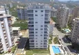 Купить Квартира в районе Махмутлар трехкомнатная в современном жилом комплексе 13 