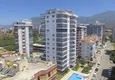Купить Квартира в районе Махмутлар трехкомнатная в современном жилом комплексе 5 