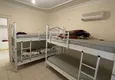 Доступная покупка Квартира в Махмутларе с мебелью в жилом комплексе, с инфраструктурой 10 