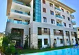 Купить Квартира в Алании – район Оба, двухуровневая с выходом в сад 1 
