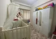 Доступная покупка Квартира в центре Алании четырехкомнатная в комплексе городского типа 10