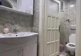Доступная покупка Квартира в центре Алании четырехкомнатная в комплексе городского типа 11