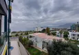 Доступная покупка Двухкомнатная квартира в Каргыджаке в комплексе на первой береговой линии 11 