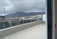 Доступная покупка Пентхаус-дуплекс в Махмутларе меблированный с видом на горы, море и историческую крепость 14