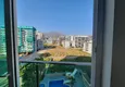 Доступная покупка Квартира в Махмутларе с видом на море и горы в комплексе с богатой инфраструктурой 18 